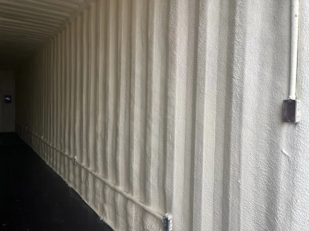 Forty foot shipping container insulated with closed cell spray foam