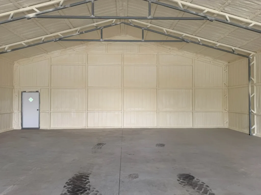 Metal building interior fully spray foamed by Nexus Foam Insulation