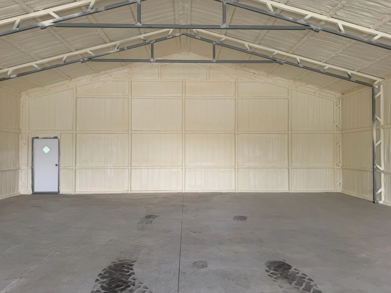 Metal building interior fully spray foamed by Nexus Foam Insulation